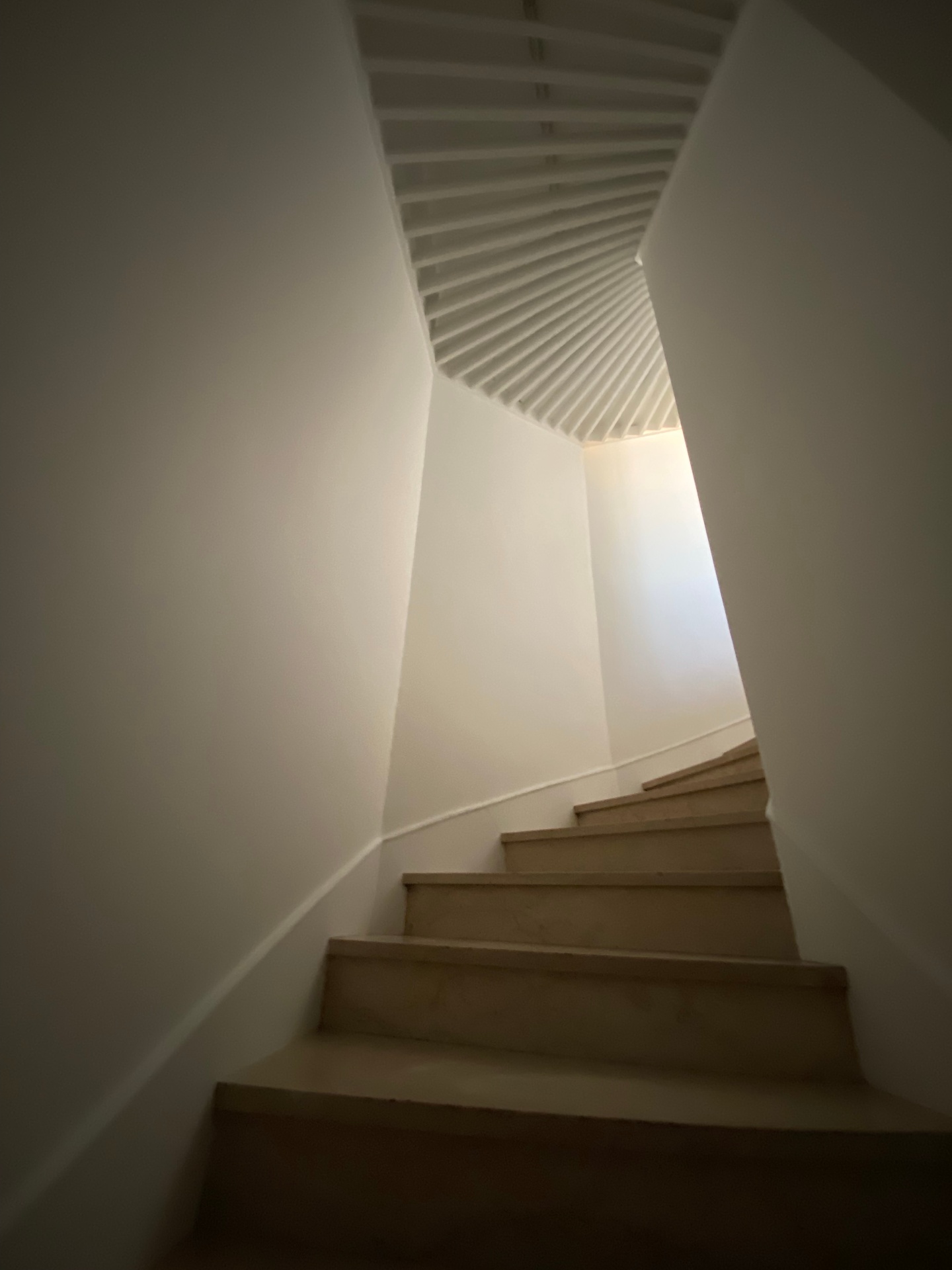 Bespoke stone staircase with ribbed ceiling