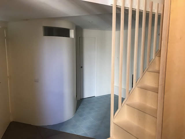 Entrance hall with bespoke timber screen